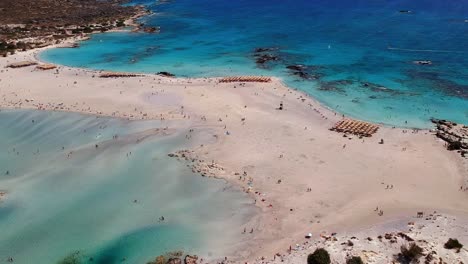 Drone-shot-of-of-this-fine-white-sand,-pinkish-at-some-spots-breathtaking-Elafonissi-beach