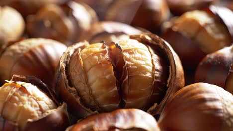 a close-up view of roasted chestnuts, showcasing their deliciously cracked shells and tender, golden-brown flesh ready for tasting or culinary creations