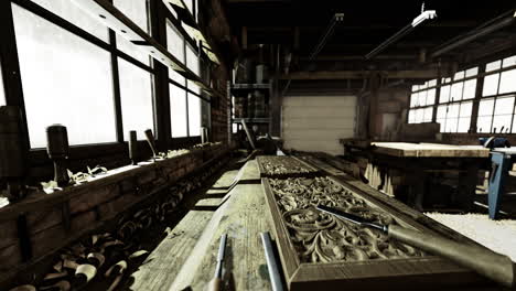 woodworking shop interior with tools and workstations during daylight