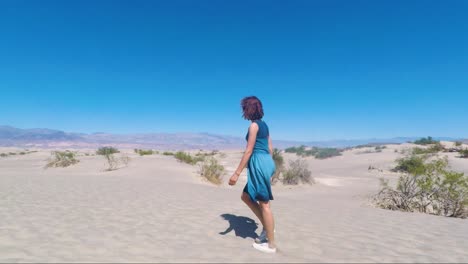 woman walking in the desert