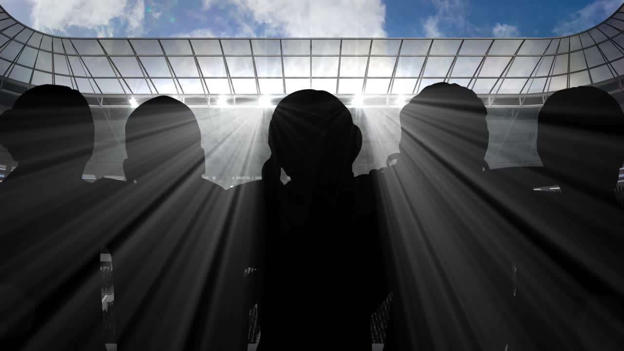 스포츠 경기장 위 를 포옹 하는 스포츠 팬 들 의 실루 ⁇  의 애니메이션