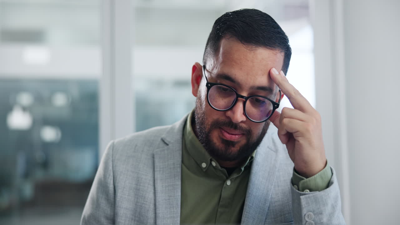 Stressed Businessman at Laptop