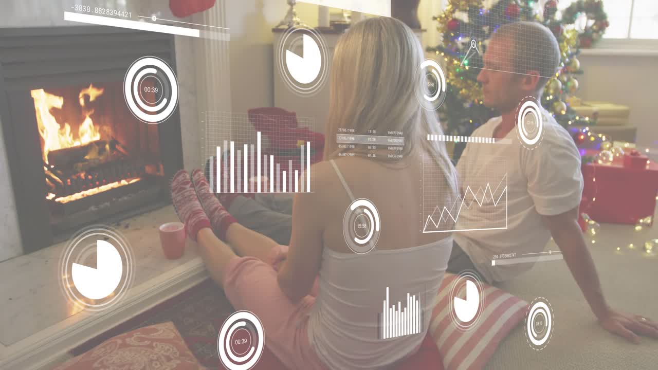 Fire flickering initiating data HUD as couple warming feet and sipping mugs by holiday fireplace
