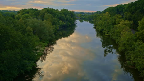 serene river reflection at sunset