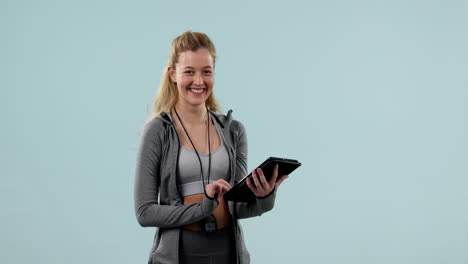 Happy,-woman-and-personal-trainer-with-tablet