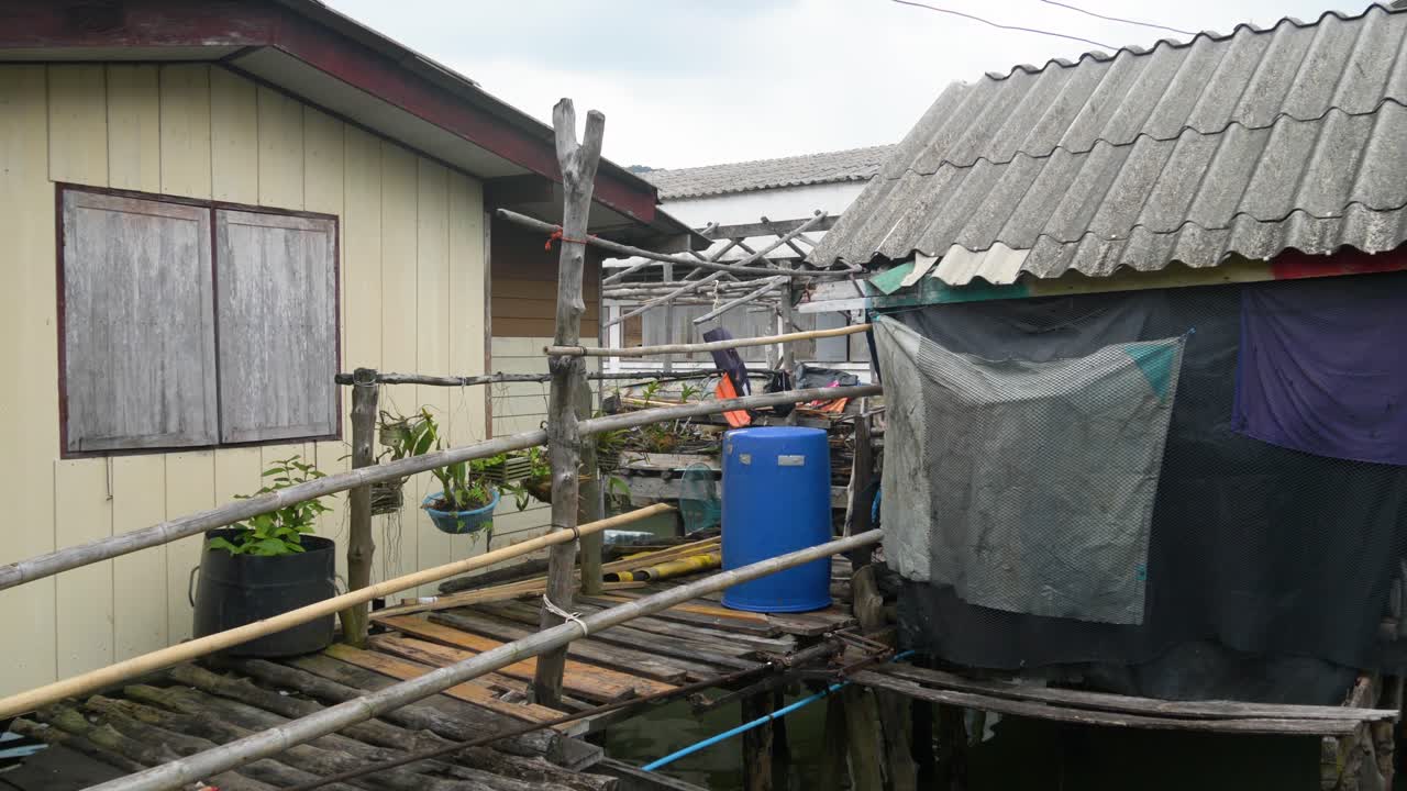 Fishing village on Koh Panyee island, Thailand, featuring wooden houses and bamboo walkways