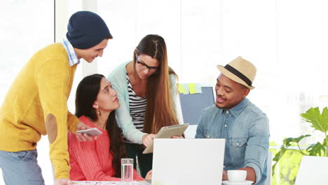 creative hipster team working together in an office