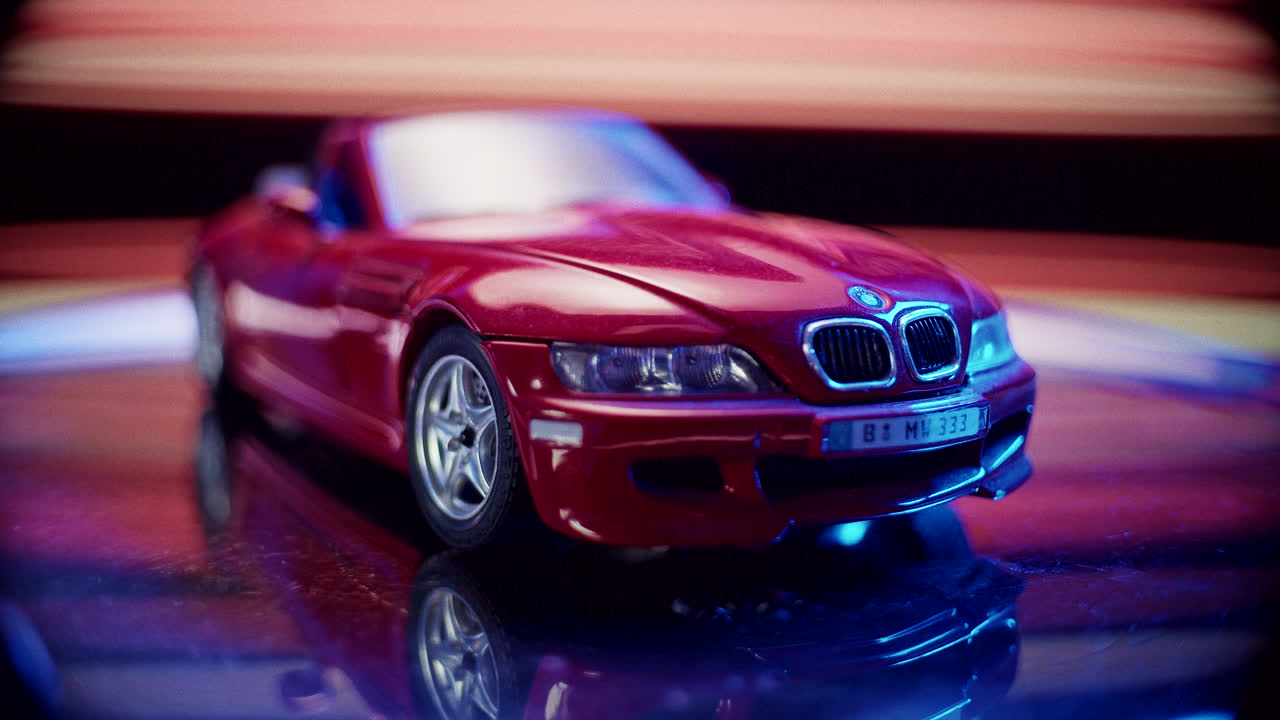 Red BMW Z3 Toy Car Model with Dramatic Lighting