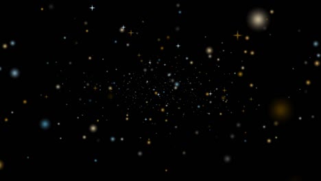 deep gold snow and ice star dust falling slowly and faded on black screen