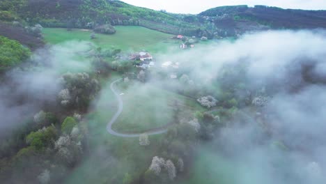 Banska-Bystrica,-appearing-like-a-misty-dreamland-surrounded-by-the-foggy-wilderness