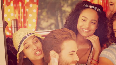 Hipsters-taking-a-selfie-in-camper-van-