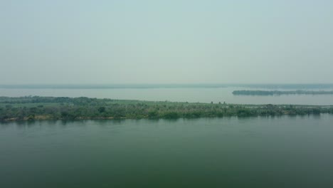 aerial: flooded islands in the parana river in paraguay on a misty morning