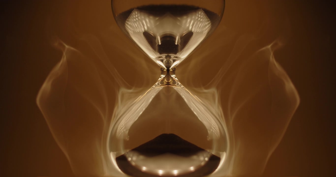Abstract hourglass on golden background