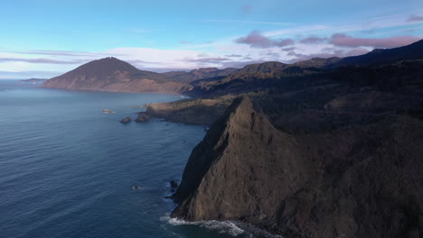 blue ocean oregon coast with sea stacks and cliffs near humbug mountain