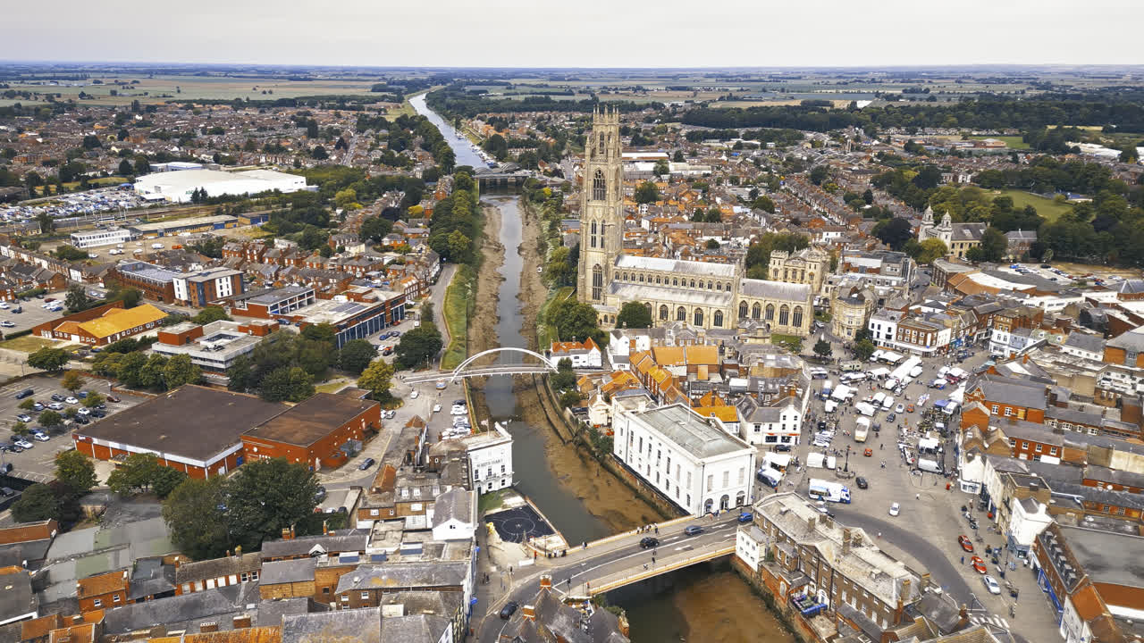 scenic beauty of Boston, Lincolnshire, in mesmerizing aerial drone footage: Port, ships, Saint Botolph Church , Saint Botolph's Bridge