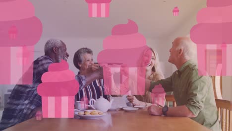 Animation-of-cake-icons-over-diverse-group-of-seniors-talking