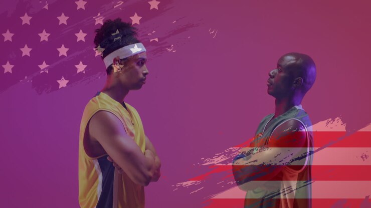 Animation of american flag over african american male basketball opponent players facing off