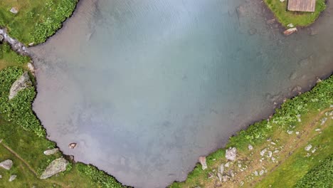 top drone shot of small lake