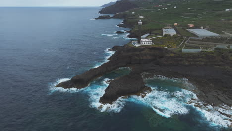 rocky coast and punta cumplida lighthouse: an aerial view