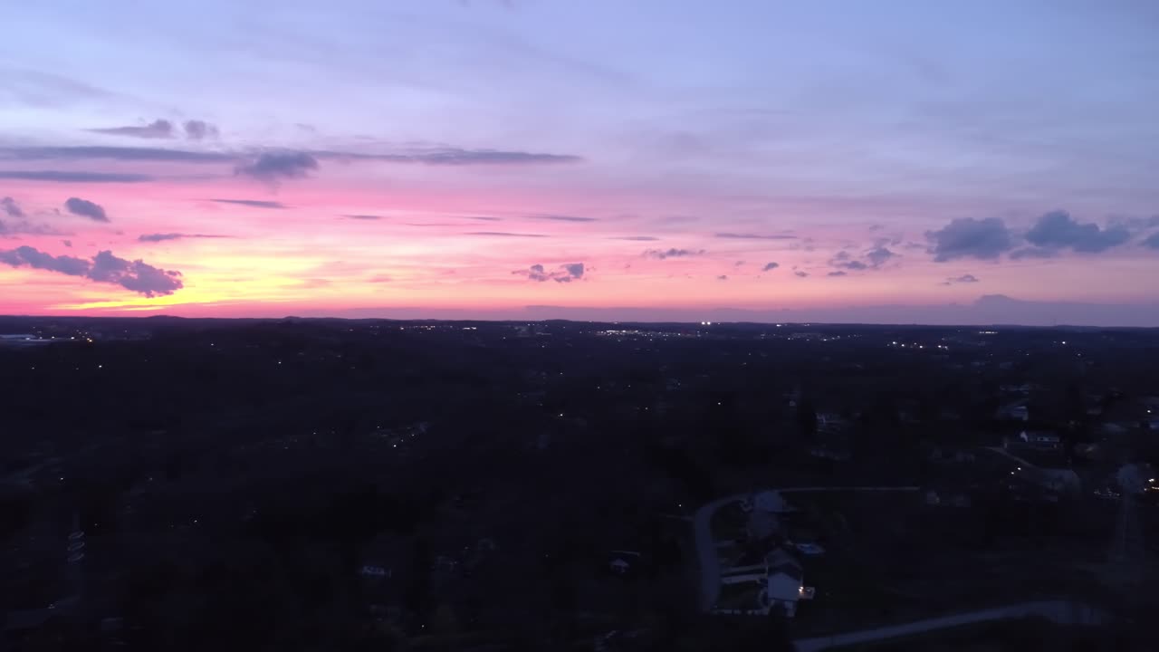 Aerial View of Suburban City at Sunset