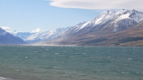lake ohau shore and mountains in new zealand - wide shot