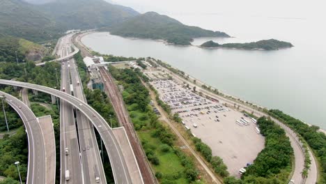 Traffic-on-a-rural-highway-interchange-in-Hong-Kong,-Aerial-view