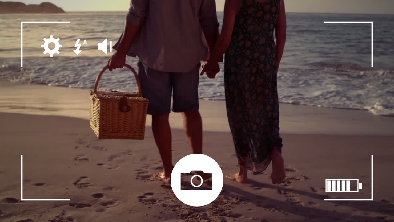 tomando fotos de una pareja con una cámara digital