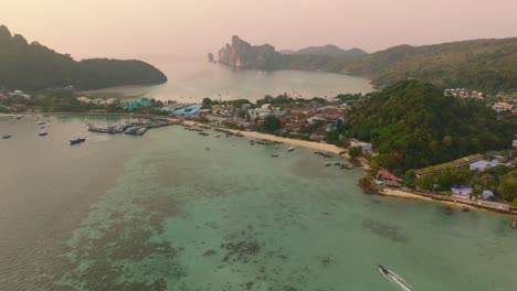 4K-aerial-drone-footage-of-Phi-Phi-Island-during-a-sunset,-Thailand,-Koh-Phi-Phi,-Asia