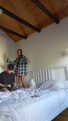 couple relaxing in bedroom