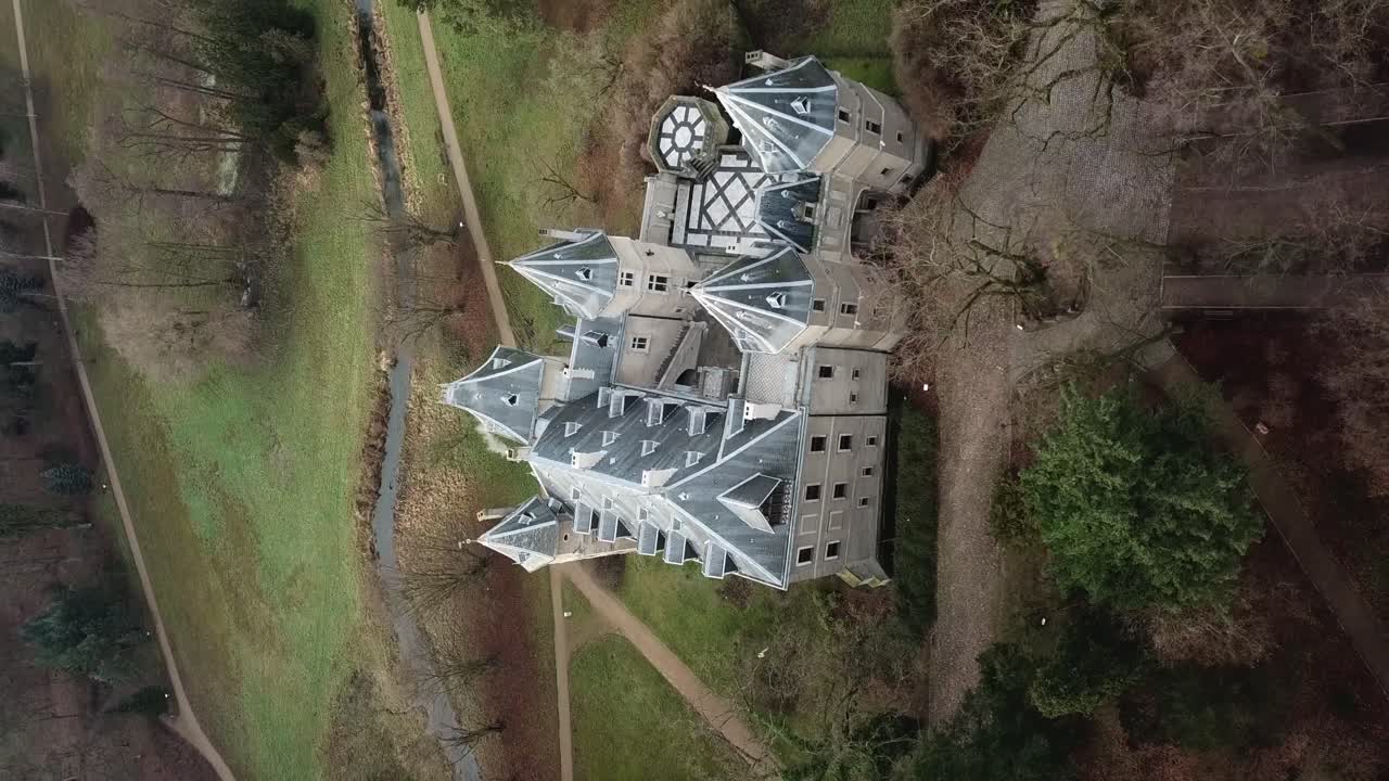 Gołuch&oacute;w Castle in fall through vertical drone shots