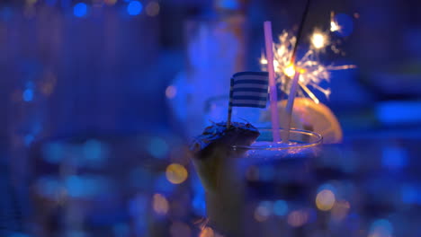 Bar-cocktails-with-sparkler-and-Greek-flag