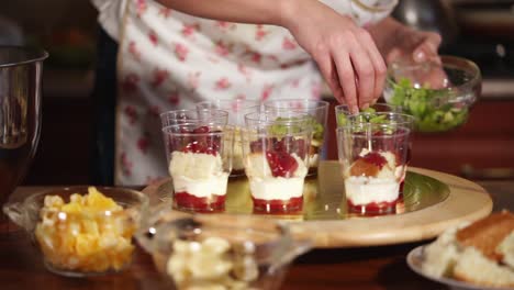 making layered desserts in glasses