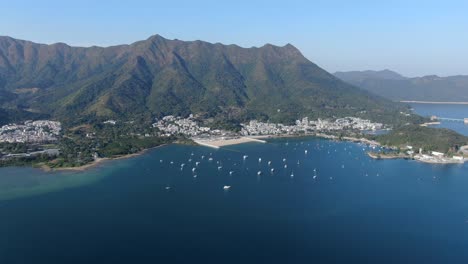 Vista-Aérea-De-La-Costa-De-Hong-Kong-Lung-Mei-Tsuen,-Incluida-Una-Extensión-De-Playa-Artificial