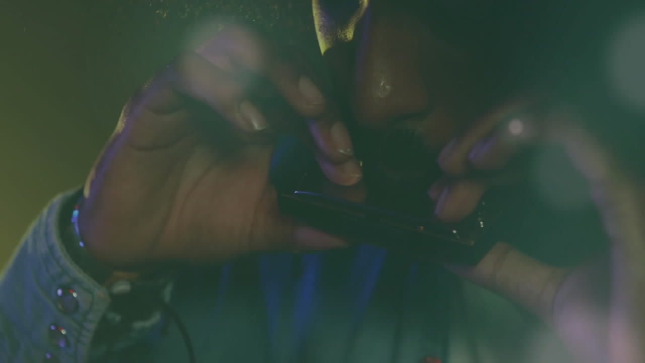 man lighting hand rolled cigarette in lounge with animated smoke particles and health chart overlay