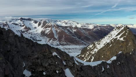 Wintry-Snow-Landscape-in-the-Italian-Rhaetian-Alps-Mountains,-Aerial