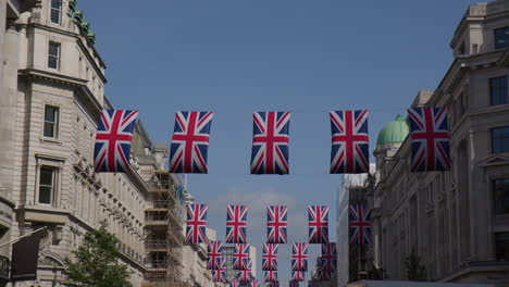 flags on the regent street in the city centre of london, england, united kingdom