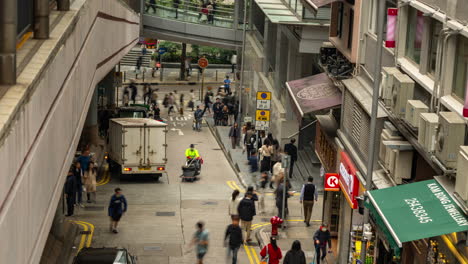 hong kong - 19 march 2025 : timelapse looking down onto a street scene in hong kong central