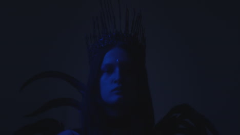 mysterious woman in gothic crown