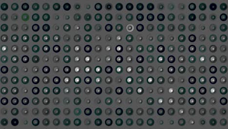 abstract geometric pattern of circles in shades of gray and green