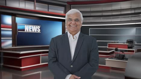 Happy-Indian-senior-journalist-smiling