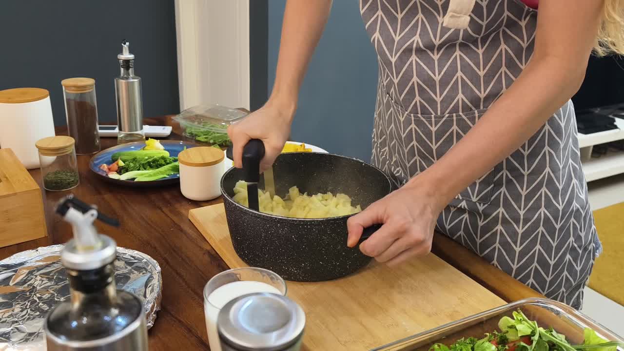 Making mashed potatoes in the kitchen
