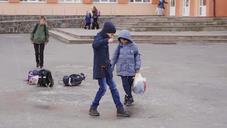 children walking on school grounds