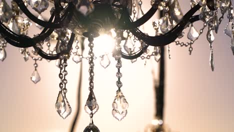 chandelier sun flares through glass