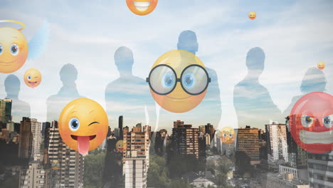 animation of emoji icons flying up with silhouetted people over cityscape