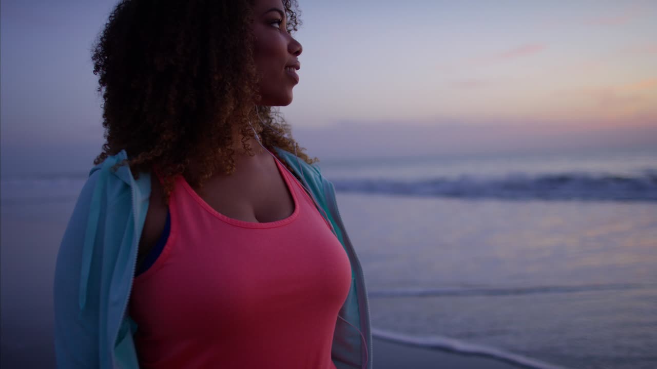 Voluptuous Ethnic female gentle fitness walking with headphones