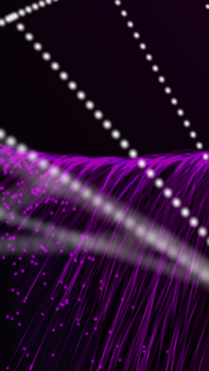 Animation of dna strand spinning with purple light trails over black background