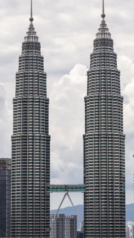 Kuala Lumpur petronas towers and skyline in vertical