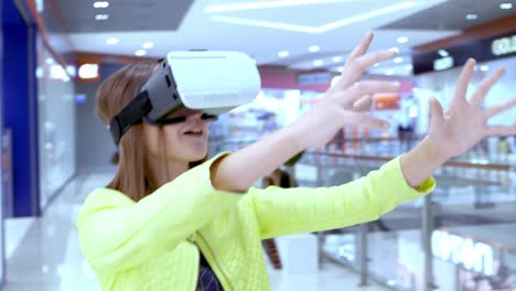 woman experiencing virtual reality in a shopping mall