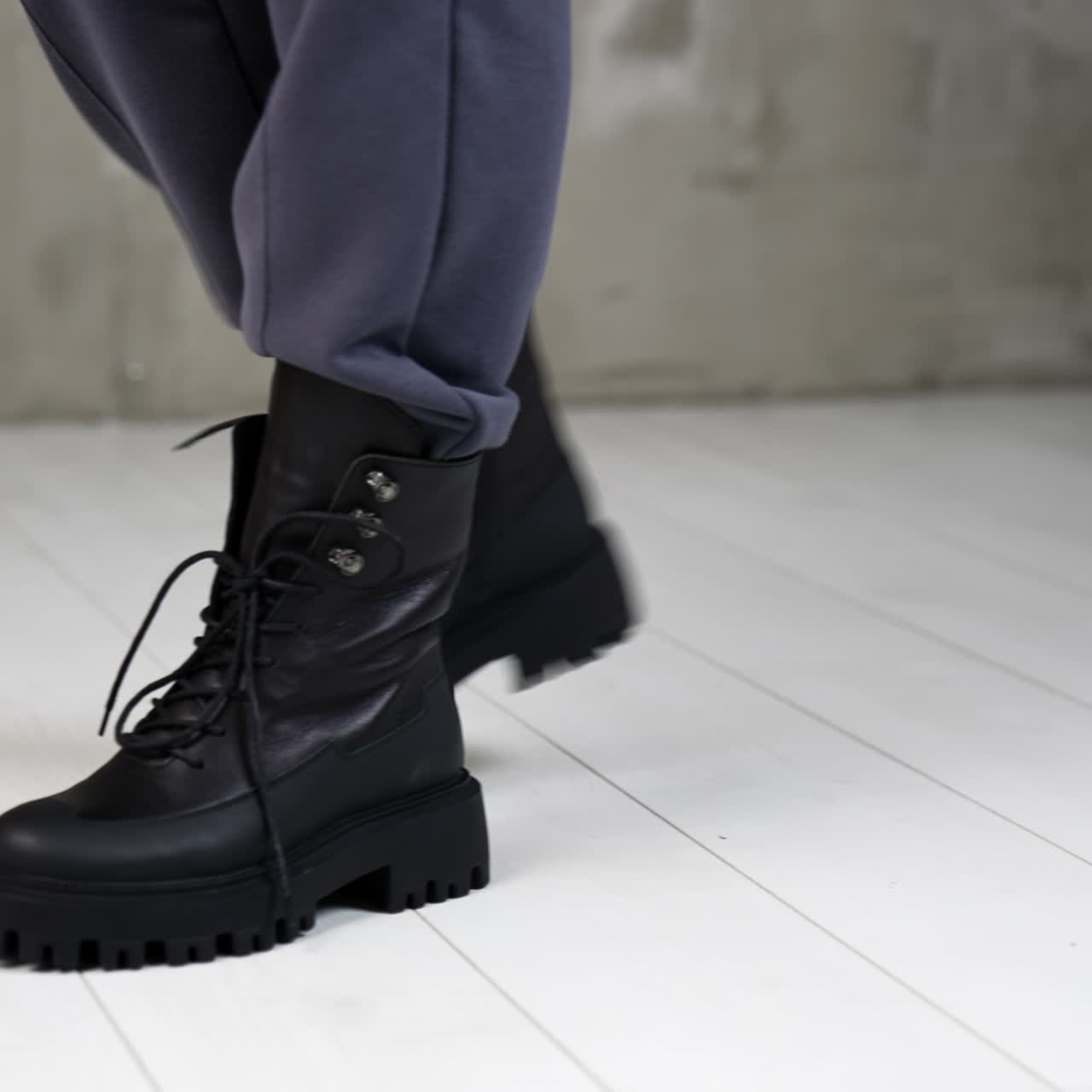 Women footwear showroom. Elegant woman fashion shoes posing