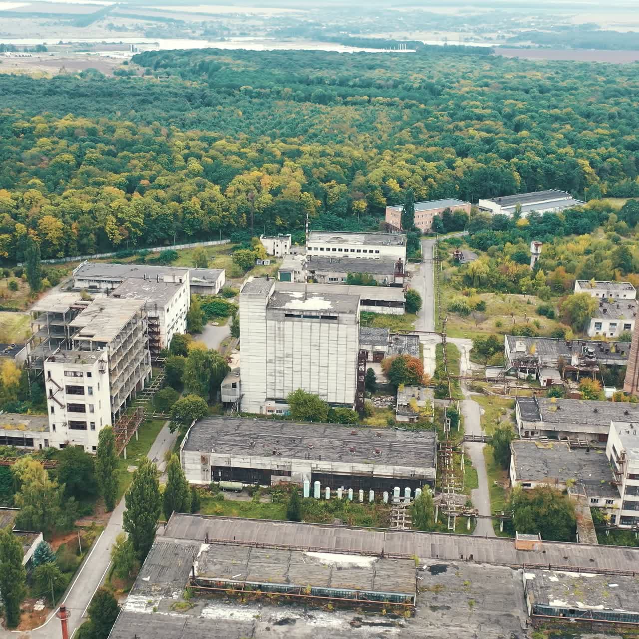 Big factory buildings drone view. Cement industrial factory building equipment